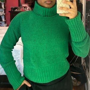 Green turtleneck sweater